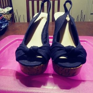 Report open-toe wedges